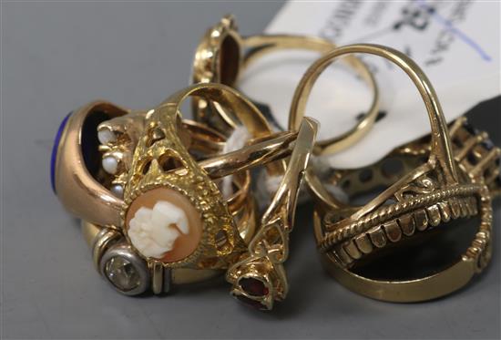 Eight assorted 9ct god and gem set dress rings, including cameo.